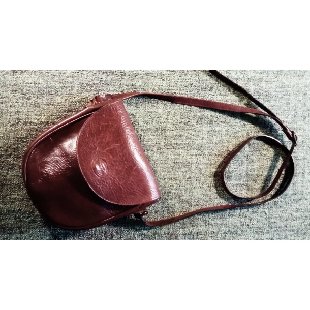 Lille vintage skuldertaske i kraftigt skind med trykknap